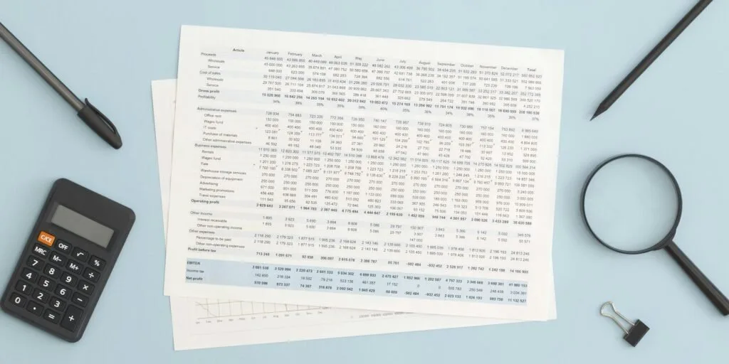 Financial analyst reviewing reports in Nairobi for a Kenyan business
