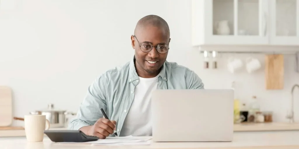 Tax expert reviewing tax compliance documents for a Kenyan business
